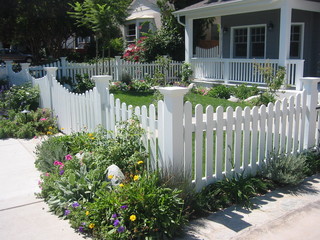 a picket fence is the right fence for different home styles